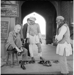 Norman Rockwell entering a mosque, Delhi, India, 1962. Photo by Molly Rockwell. From the permanent collection of Norman Rockwell Museum.