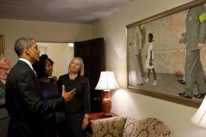 President Barack Obama, Ruby Bridges, Norman Rockwell Museum Director Laurie Norton Moffatt, and Museum President Anne Morgan, view Norman Rockwell’s "The Problem We All Live With," hanging in a West Wing hallway near the Oval Office, July 15, 2011. Official White House Photo by Pete Souza. Courtesy The White House. All rights reserved.