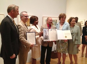 Artist Jerry Pinkney (center) was presented with a special commendation by Pennsylvania's First Lady, Susan Corbett (right) at The Philadelphia Museum of Art on June 26, 2013 ("Jerry Pinkney Day"). Philadelphia Museum Director and CEO, Timothy Rub (far left) joined the artist for the opening of "Witness: The Art of Jerry Pinkney," on view through September 22, 2013. Photo by Stephanie Plunkett for Norman Rockwell Museum. ©Norman Rockwell Museum. All rights reserved.